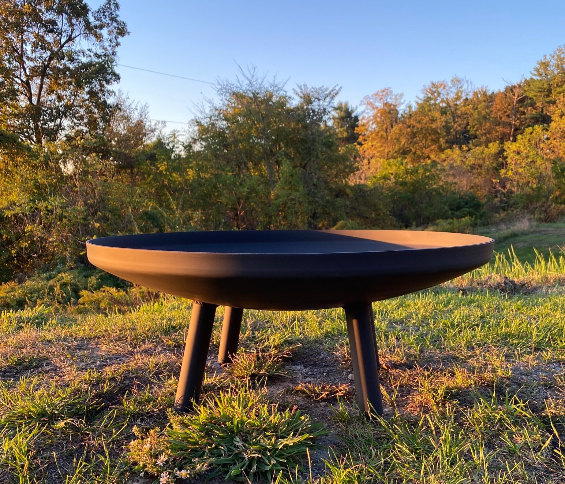 Round firepit in the sunset