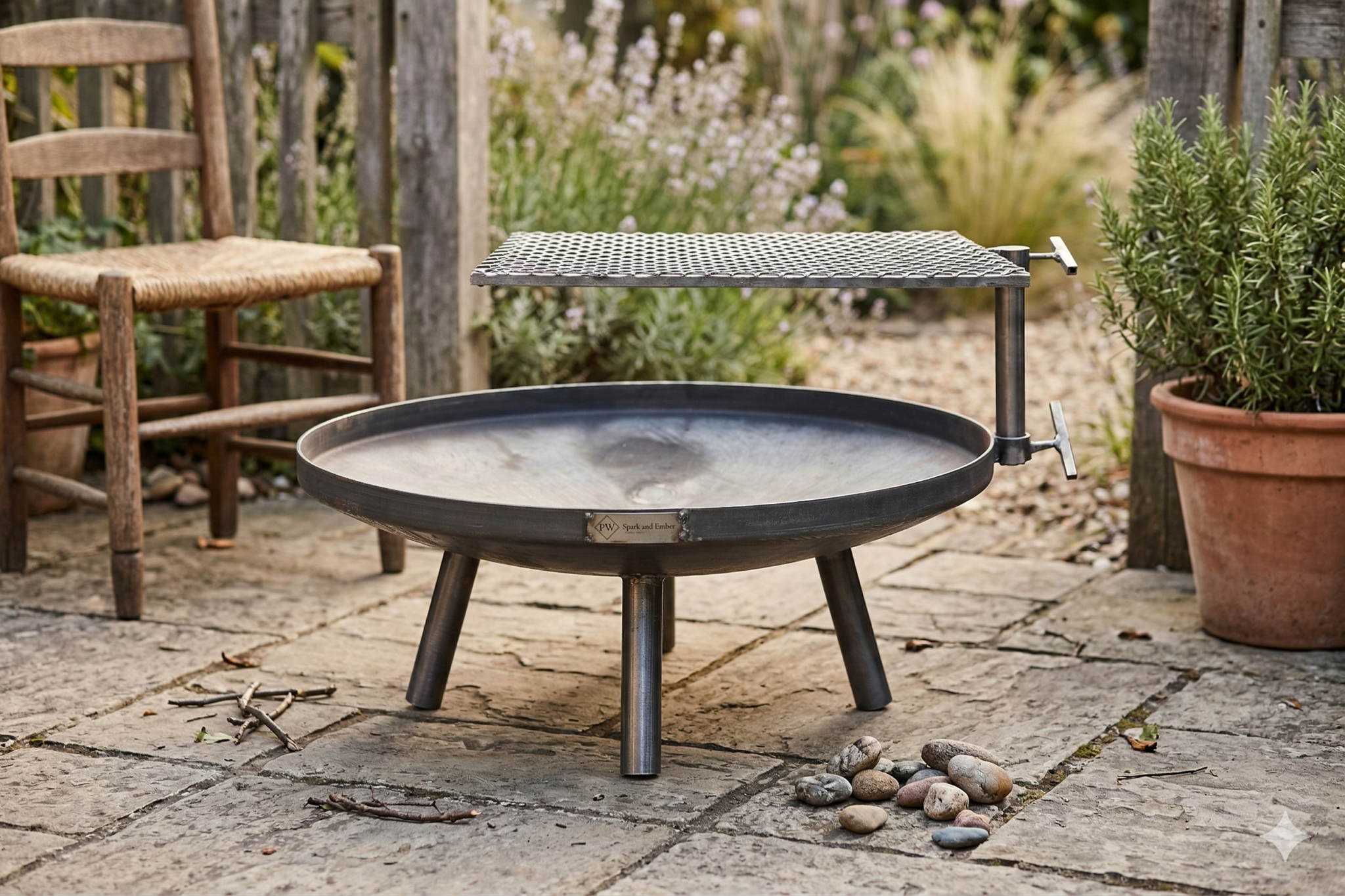 Round Firepit with a grilling grate in an outdoor garden